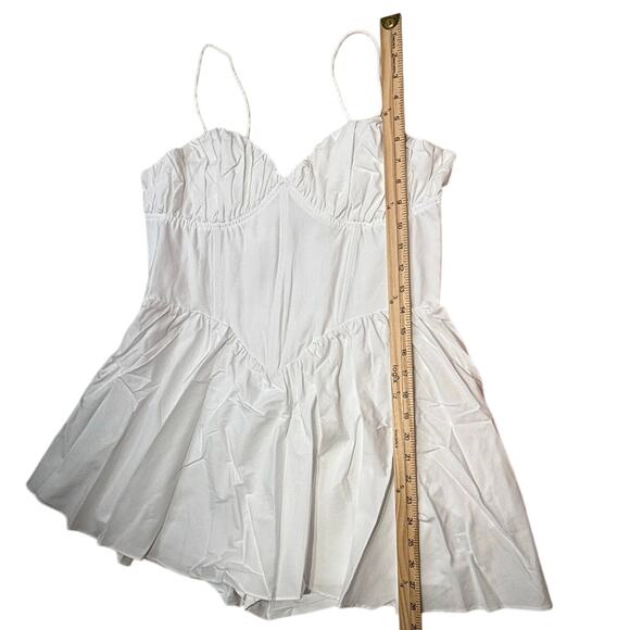 Good American Sleeveless V-Neck Poplin Babydoll Mini Dress - Picture 8 of 10